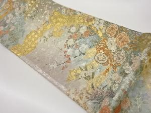 束ね熨斗に草花・鼓・流水模様織出し袋帯